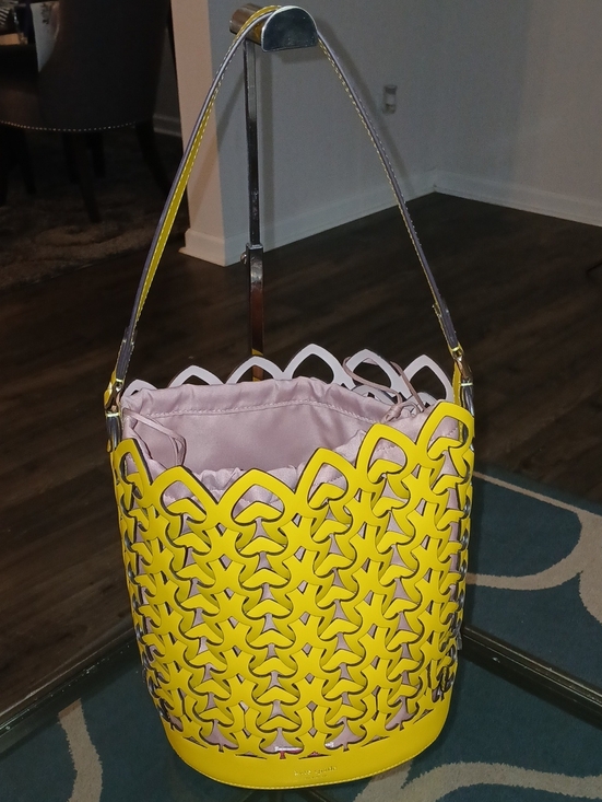 kate spade Handbags - Kate Spade Dorie Yellow Laser-Cut Bucket Bag with Pink Liner